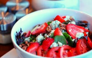 Salad with fresh strawberries, feta cheese and spinach